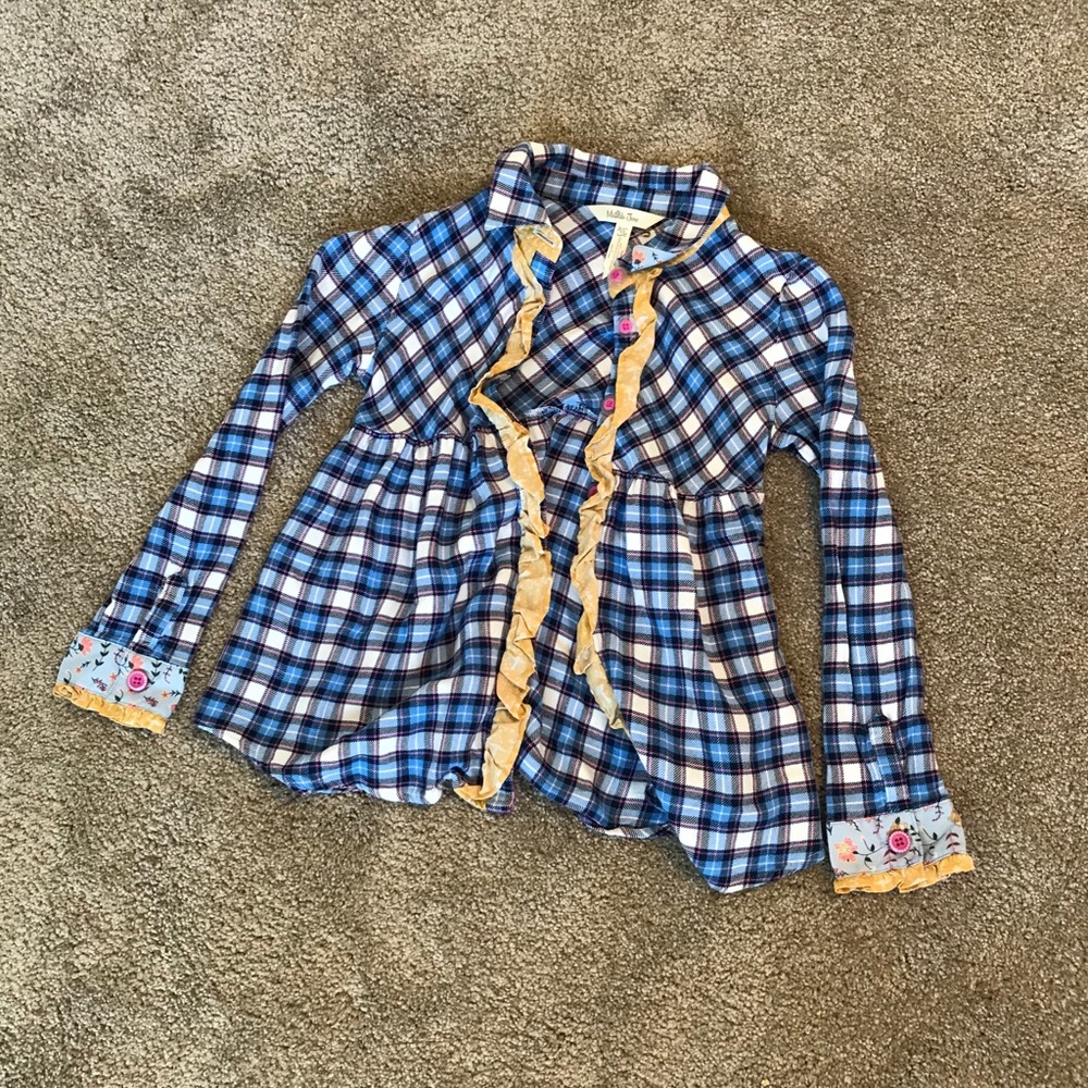 Girly button down shirt.